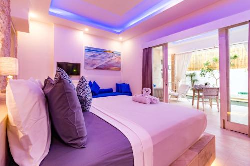Ένα ή περισσότερα κρεβάτια σε δωμάτιο στο Cocotoa Boutique Hotel & Villa