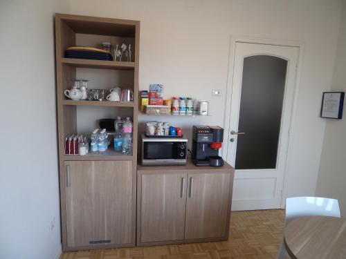 Una cocina o zona de cocina en A Due Passi Dal Cielo