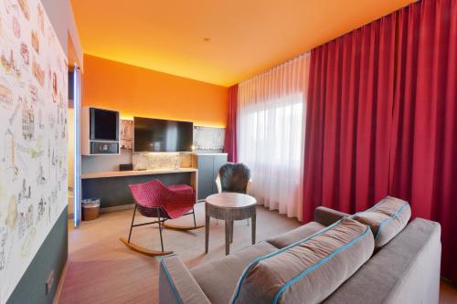 Ruang duduk di Designhotel + CongressCentrum Wienecke XI.