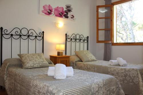 Posteľ alebo postele v izbe v ubytovaní Villa Moll