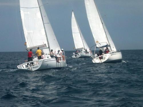 a group of three sailboats in the water at Ashanti Garden Luxury Short Term Rental Duplex Altea in La Nucía