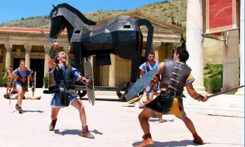 a group of men dressed in medieval costumes standing in front of a statue at Ashanti Garden Luxury Short Term Rental Duplex Altea in La Nucía