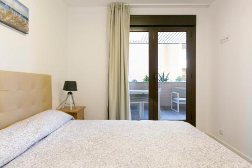 Ліжко або ліжка в номері Brisas del Arenal
