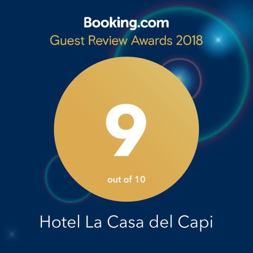 a flyer for a hotel la casa del carhi guest review awards with at Hotel La Casa del Capi in Holbox Island