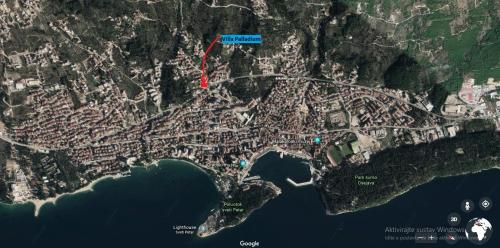 a map of a city with a red highlighted at Villa Palladium in Makarska