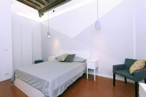 Posteľ alebo postele v izbe v ubytovaní Monte Giordano Flats
