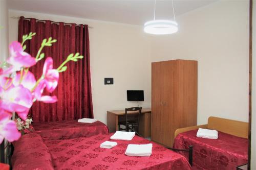 Postel nebo postele na pokoji v ubytování Hotel Eurorooms