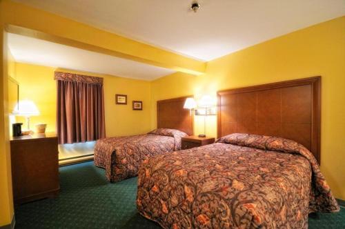 Postelja oz. postelje v sobi nastanitve Driftwood Inn