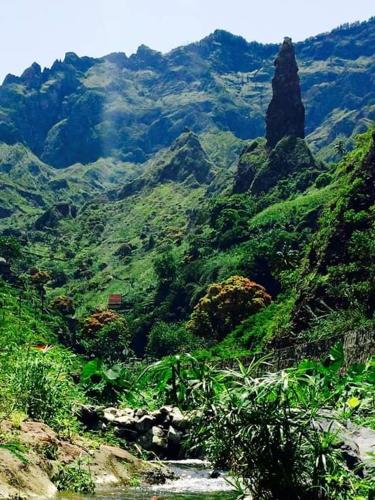 a view of a mountain with green vegetation at casa xoxo in Ribeira Grande