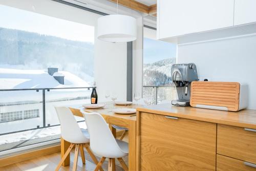 Kuchyňa alebo kuchynka v ubytovaní Apartament Skrzyczne