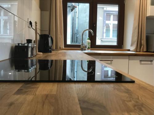 Dapur atau dapur kecil di Drzewna Apartamenty-Drzewna
