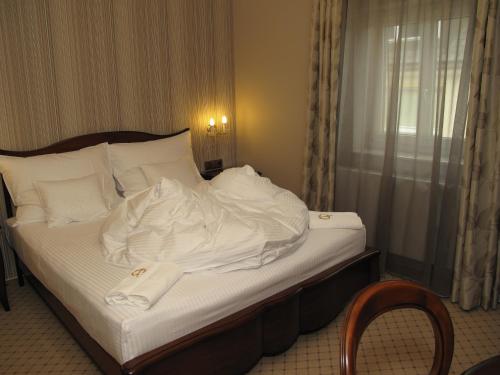 Postel nebo postele na pokoji v ubytování Hotel zum Heiligen Geist