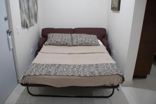 Posteľ alebo postele v izbe v ubytovaní Hotel Nápoles