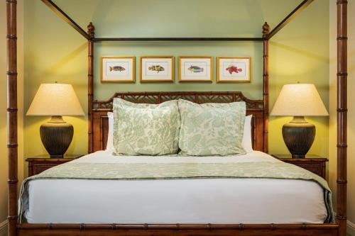a bedroom with a large bed with two lamps at Santa Barbara Inn in Santa Barbara