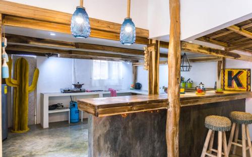 A kitchen or kitchenette at Garden loft 90sqm in the heart of El Nido- 2 bedrooms