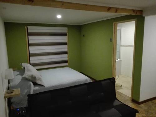Ένα ή περισσότερα κρεβάτια σε δωμάτιο στο Refugio Piedra Madre