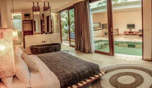 Katil atau katil-katil dalam bilik di Kumbara Villas