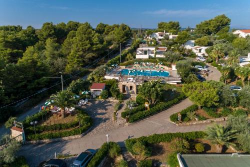 an aerial view of a resort with a pool at Villaggio Passo Dell'Arciprete in Vieste