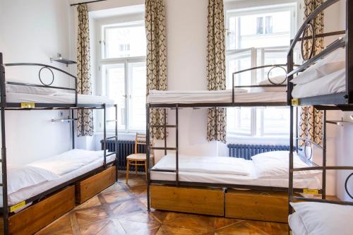 Postel nebo postele na pokoji v ubytování Sophie's Hostel