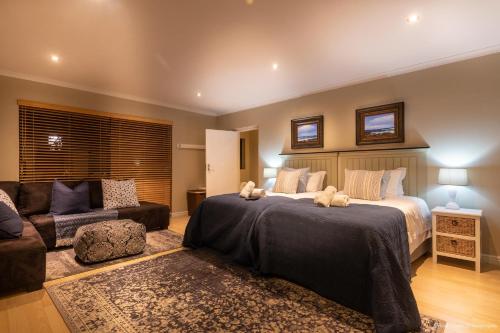 Кровать или кровати в номере Atlantic Bay Lodge