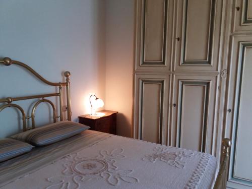 Postel nebo postele na pokoji v ubytování Agriturismo Le Castellare