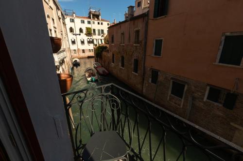 a view of an alley from an apartment balcony at Liassidi Arco in Venice