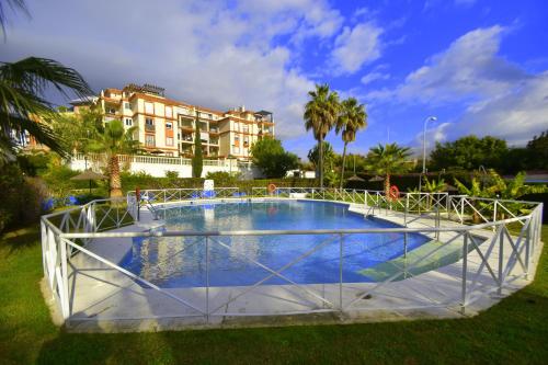 The swimming pool at or close to Reserva del Parque