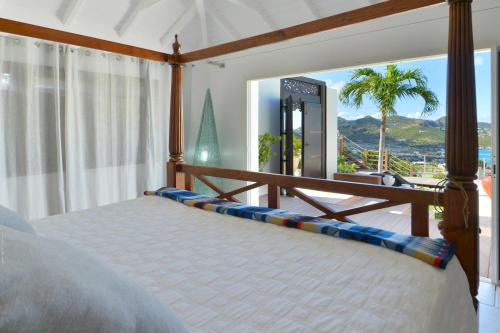 เตียงในห้องที่ Mystique luxury villa at the heart of the island
