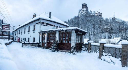 Apartmány pod Oravským hradom v zimě