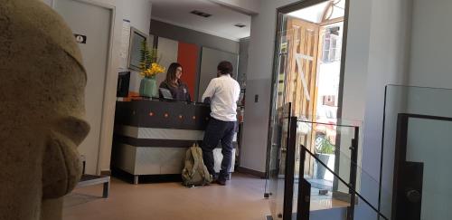 Hóspedes ficando em Hotel Boutique 17