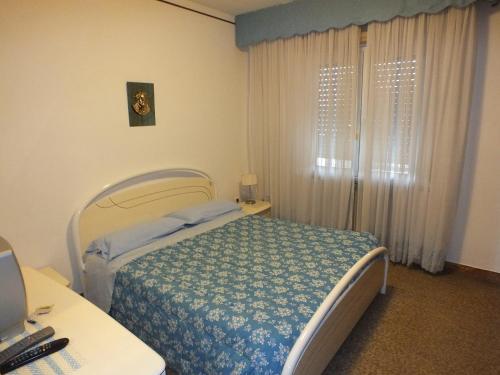 A bed or beds in a room at La Casa di Lisa a 20 km dal mare