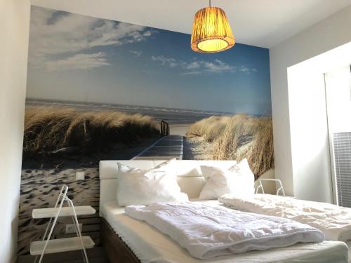 Postel nebo postele na pokoji v ubytování Strandapartment Meeresrauschen Prora Binz EG