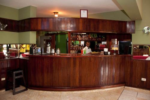 
The lounge or bar area at La Maison Hotel
