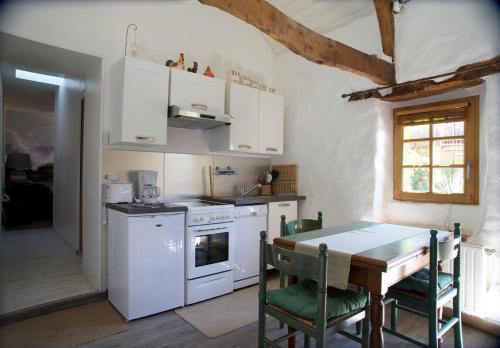Η κουζίνα ή μικρή κουζίνα στο Relais Saint Aubin
