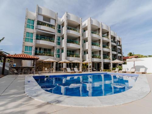 Bazén v ubytování Wave Suítes Hotel & Lounge bar nebo v jeho okolí