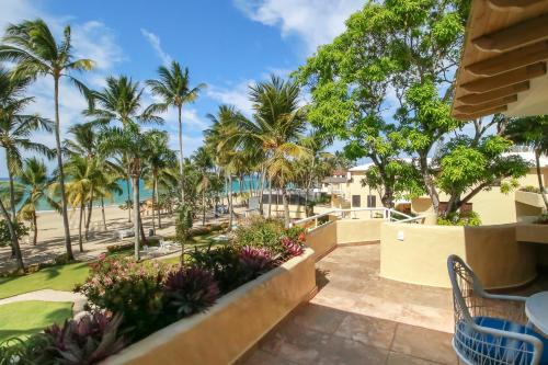 Un jardín fuera de Cabarete Palm Beach Condos