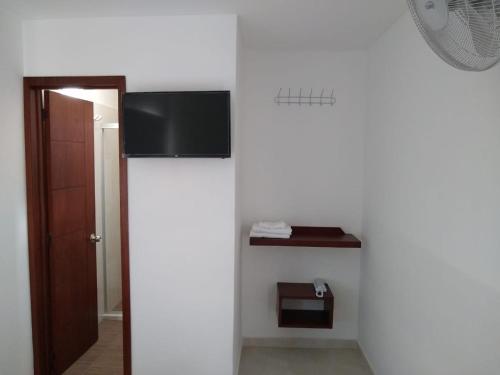 TV a/nebo společenská místnost v ubytování Hotel Don Luis