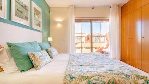 En eller flere senge i et værelse på Lux residence sea