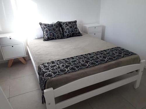 Cama o camas de una habitación en Casa Acantilados Playa & Relax