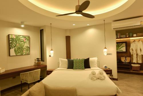 Una cama o camas en una habitación de Tungtong Beach Villas