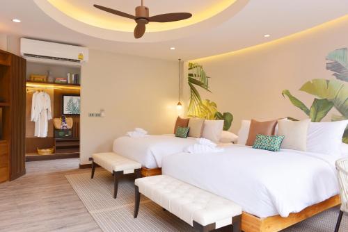 Una cama o camas en una habitación de Tungtong Beach Villas