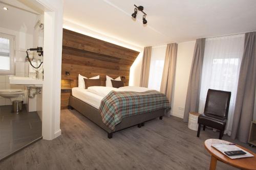 Postel nebo postele na pokoji v ubytování Hotel Nuhnetal