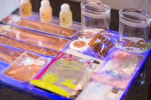 a tray filled with different types of food on a table at J Moon Villa Motel in Taipei
