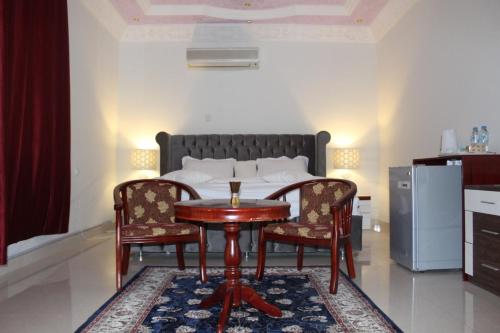 Un pat sau paturi într-o cameră la Tafadal