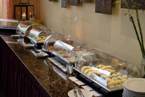 a buffet line with many different types of food at Wellness- & Sporthotel Haus am See in Arendsee