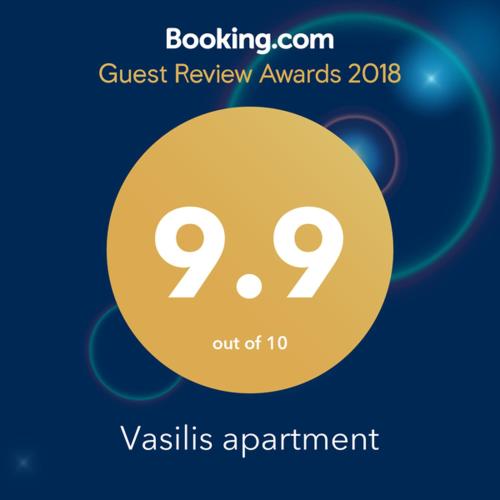 a sign that says quest review awards with a yellow circle at Vasilis apartment in Tbilisi City