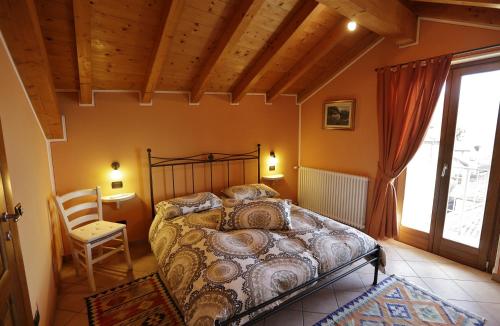 Posteľ alebo postele v izbe v ubytovaní CasAle Fe-Wo - Appartamenti con vista Lago
