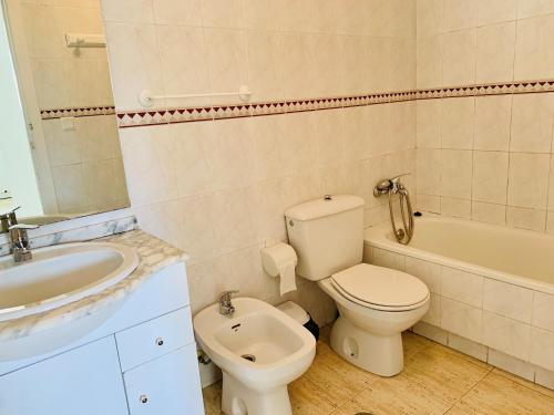 a bathroom with a toilet and a sink and a tub at A531 - Calasol - 2004 Finestrat s.l. in Cala de Finestrat