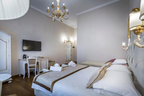 Ένα ή περισσότερα κρεβάτια σε δωμάτιο στο B&B La Terrazza Sul Duomo