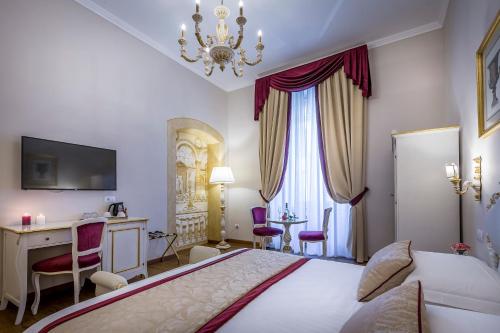 Μια τηλεόραση ή/και κέντρο ψυχαγωγίας στο B&B La Terrazza Sul Duomo
